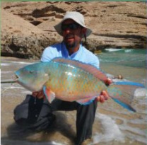 Fly fishing in Oman, foto di cattura a pesca a mosca in mare